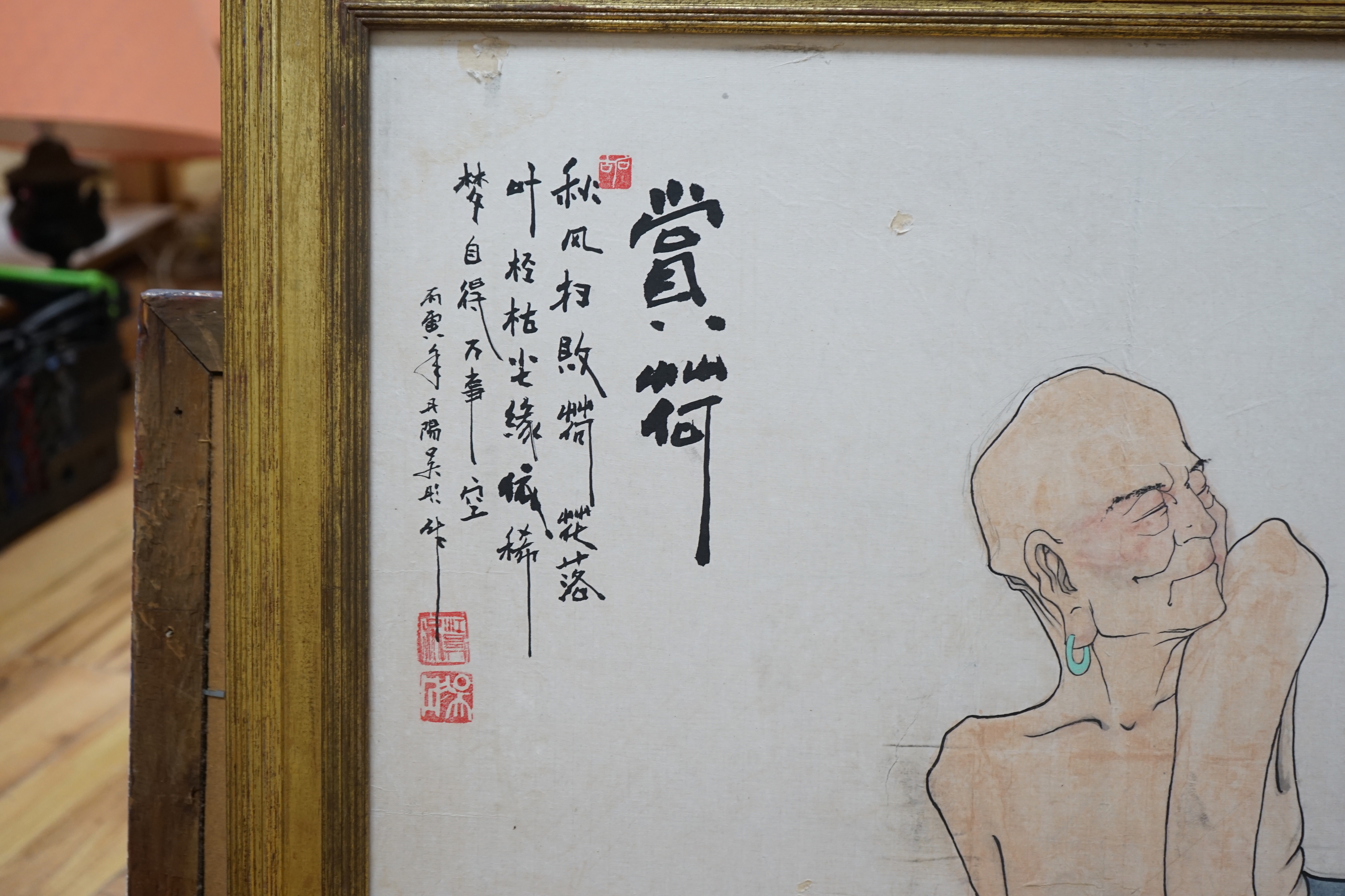 A large Chinese watercolour of a seated figure beside lotus flowers, 66 x 110cm